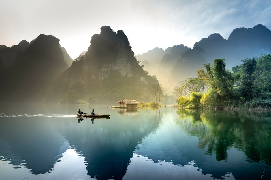 Small boat in mountains representing personal guidance